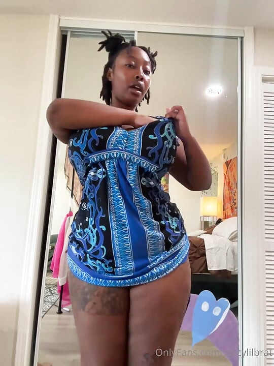 Chubby Ebony in Dress Showing Her Big Tits & Ass