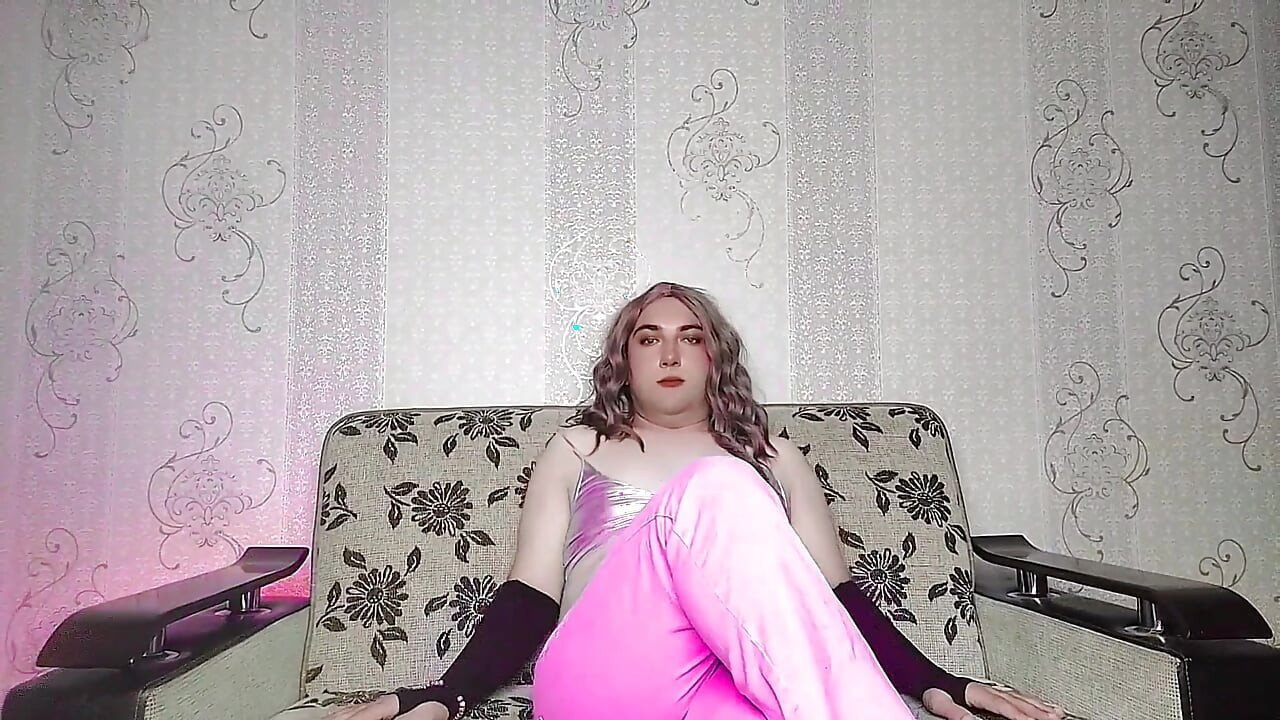 Cute femboy pulling oversized sweater over bare legs