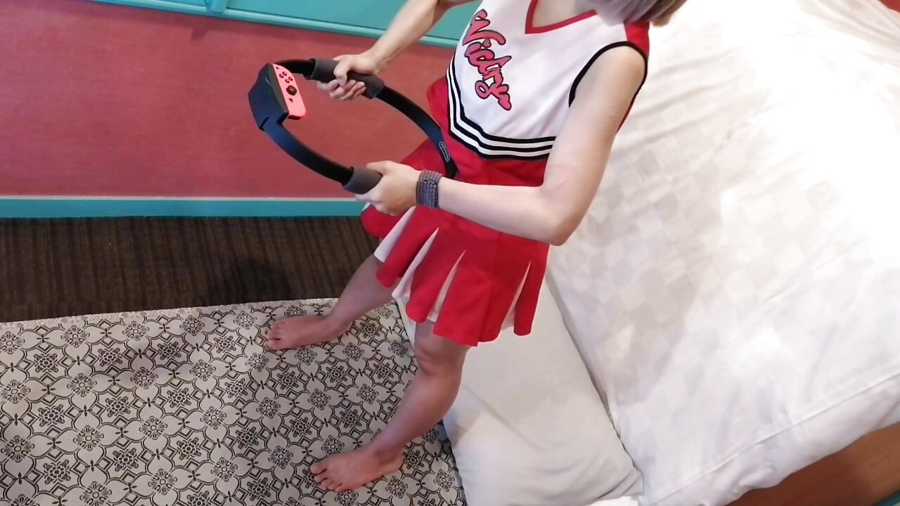 A cute, busty married woman does exercise 3 in a sexy cheerleader costume. Peeking down from above. Home made amateur Private Shoot