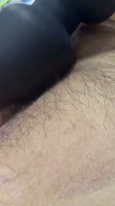 Sexy mom with her vibrator on her huge hairy pussy | Clip 1