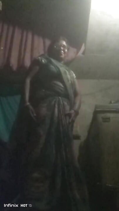 The Man Pours Water From the Jug Into the Pot at His Stepmother's House