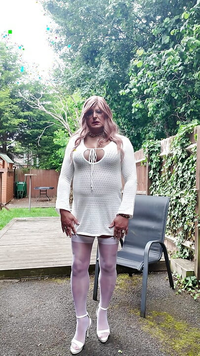 Crossdresser kellycd in white dress stockings and heels