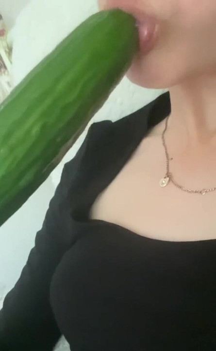 Sucking a cucumber