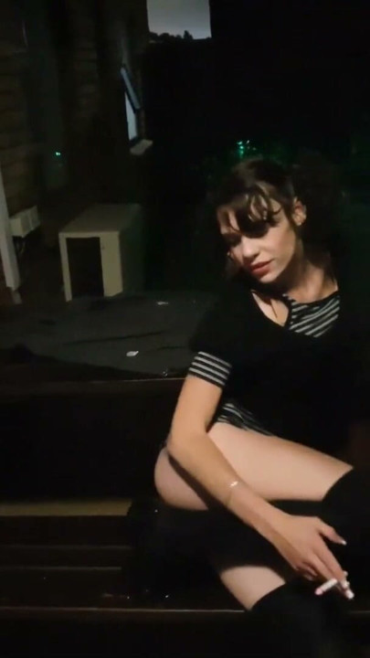 Skinny pigtail girl smoking cigarette showing her pussy | Clip 1