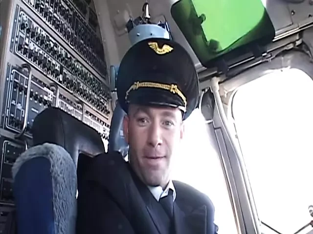 Randy pilot fondles sexy brunette in the cockpit