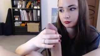 Sexy pale brunette sucking stroking big fat cock head