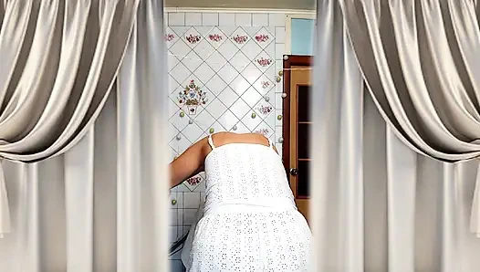 Hot housewife Lukerya. A mature Ukrainian woman shows off her figure and poses for the camera at home.