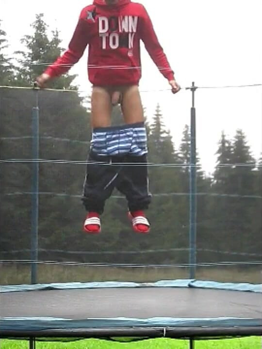 Teen Shows His Big Cock for Fun on a Trampoline at the Camp