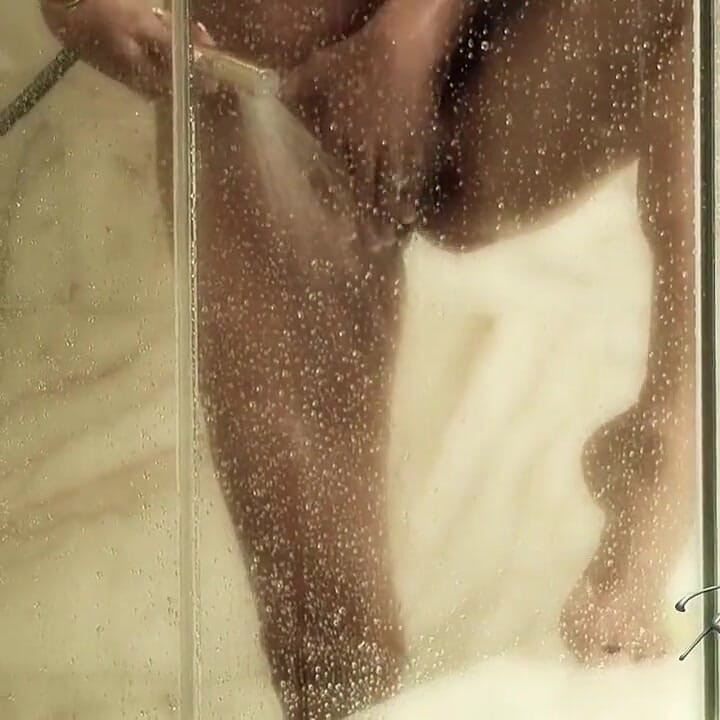 Rachel gets soaking wet in this shower tease