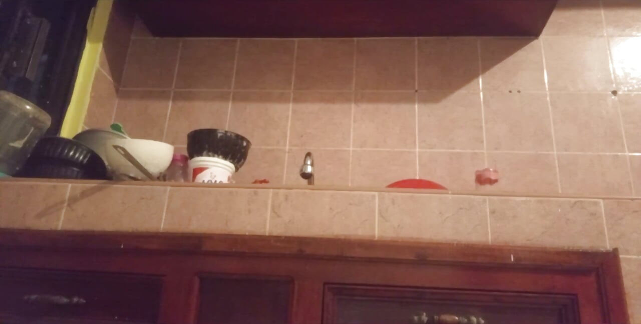 Stepmom Walks Around the Kitchen in a Thong