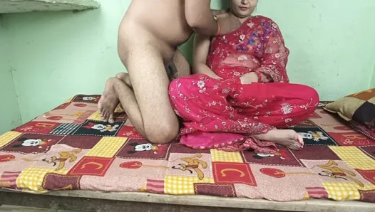 The neighbor comes to the house of the beautiful Bhabhi wearing red saree and fucks her hard.