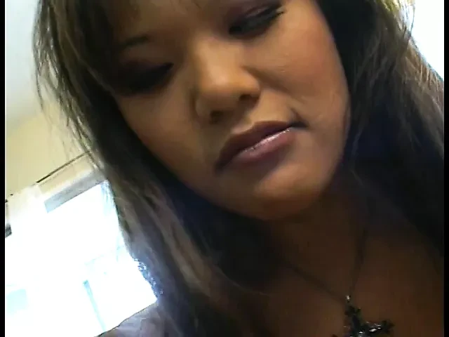 Asian dominant mistress in black outfit makes her sissy slave enjoy strapon up his ass