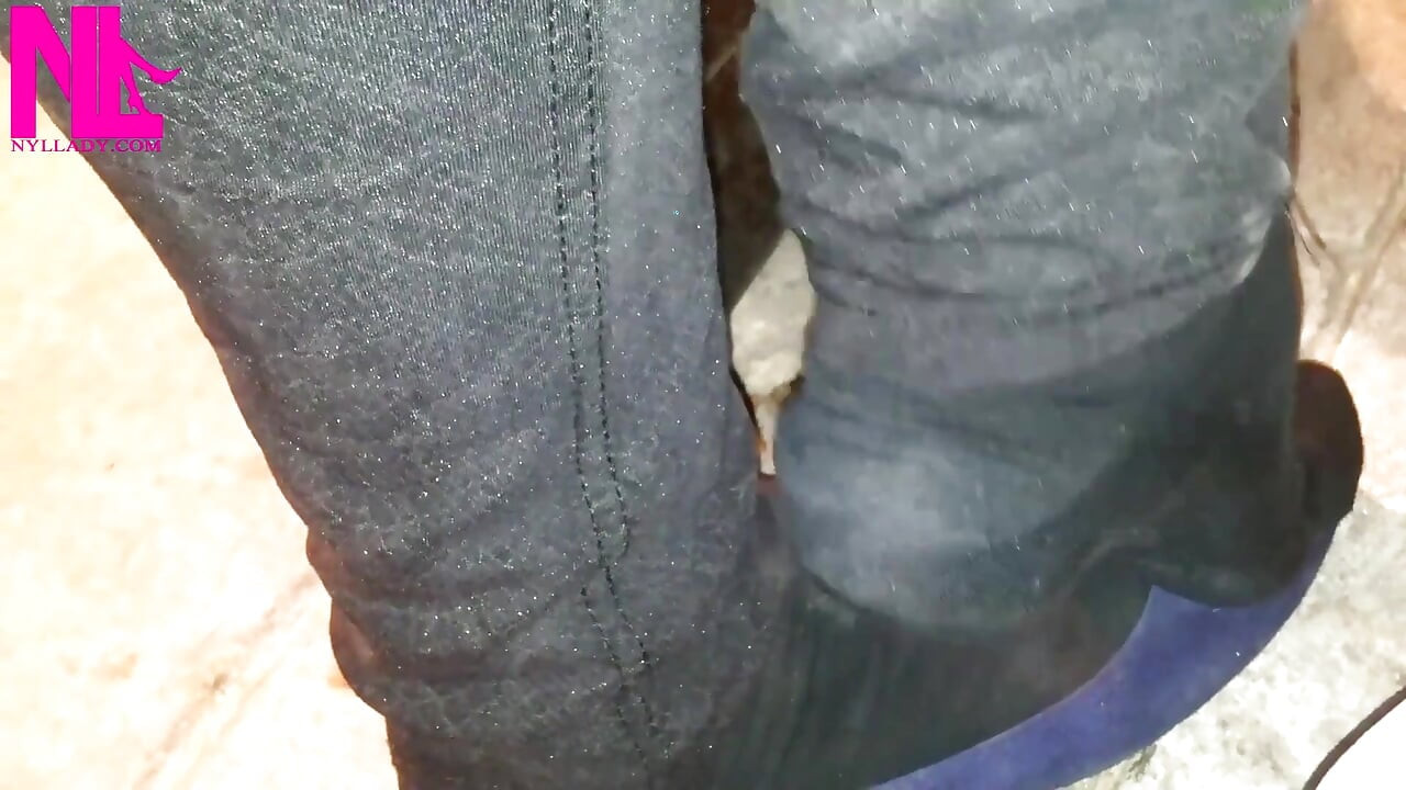Dangling in Blue Ballet Flats in a Bar