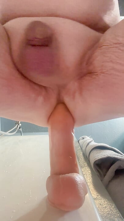 Fucking my ass again with huge dildo