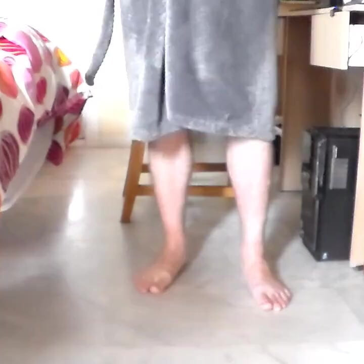 John is peeing all on his robe