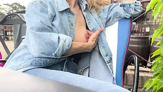 Daring exposure of my sexy boobs with pierced nipples in public bar outside