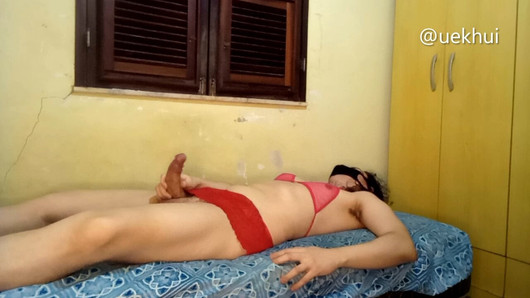 CROSSDRESSER LYING DOWN PLAYING WITH HIS COCK - UEKHUI