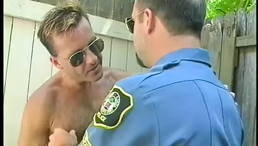 Muscular man in uniform and wearing glasses sucks and blows his colleague's hot cock