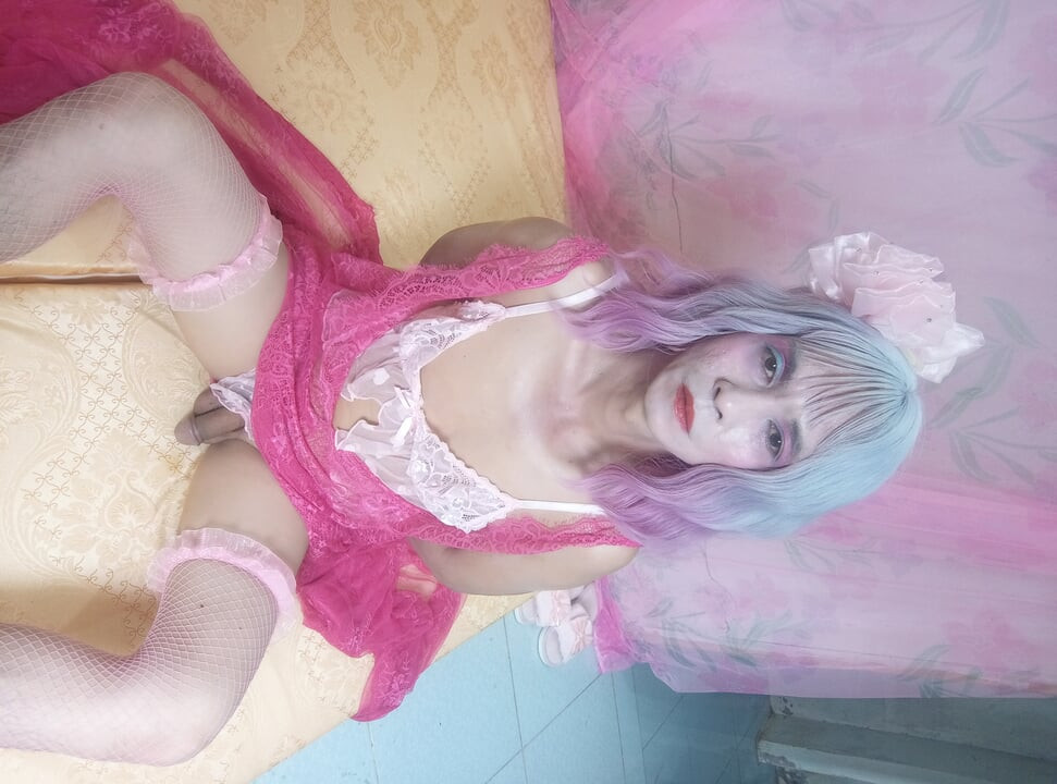 Transgender Oanh Le wears a sexy dress and masturbates.