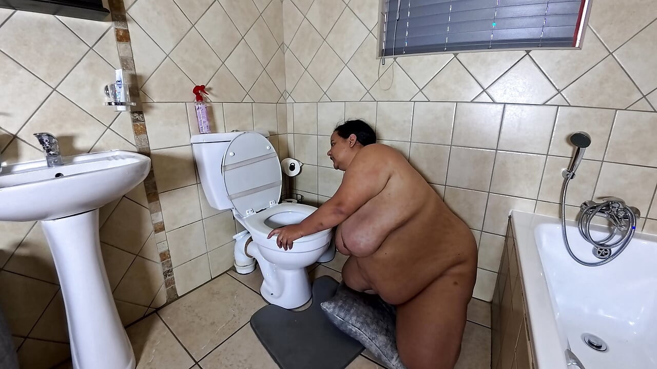 Playing with my fat pussy while licking the toilet