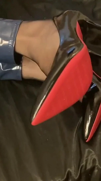 Captivating moment from "Blue Vinyl Leggins, Nylons, High Heel Pumps"