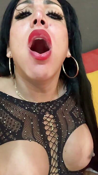 Aylla Shows off All Her Power Wearing a Sexy Outfit and Crystal Heels While Her Cock Is Rock Hard