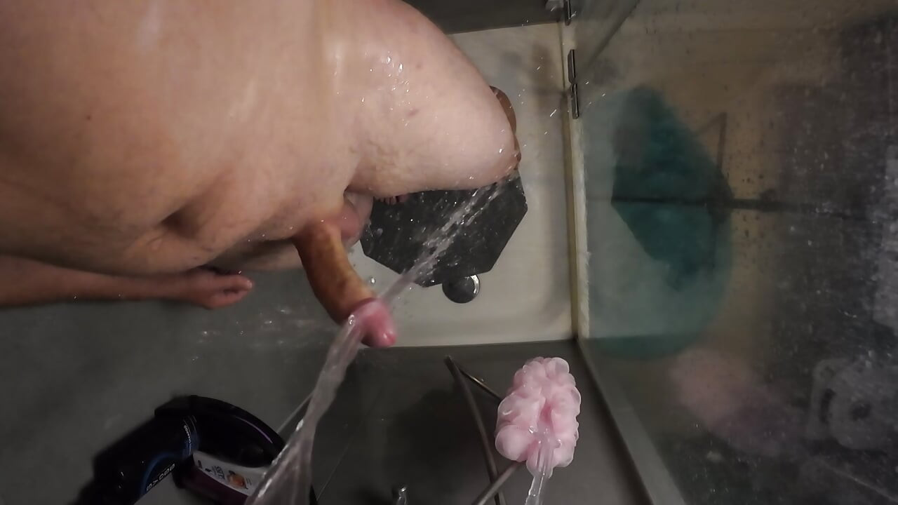 Soaping up my little dick until it gets massive. Wet edging fun in the shower.