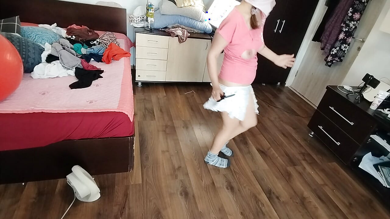 Amateur wife enjoys trying on clothes and cutting them.