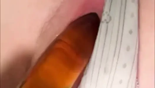 Cute girl does a huge piss in bed