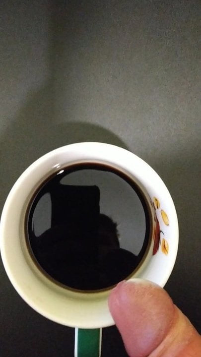 Preparing coffe for  sister.