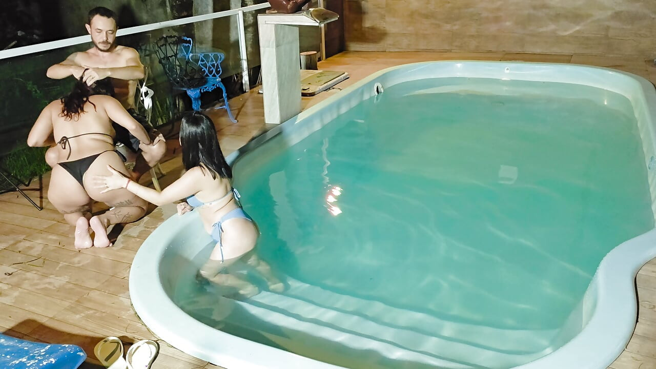 Caught in the act! Two brunettes caught masturbating in the condo's pool