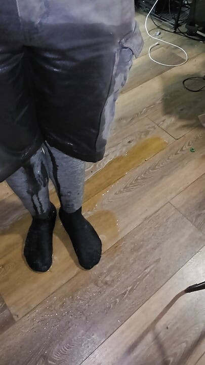 Massive flood in gray and shorts saturates wool socks