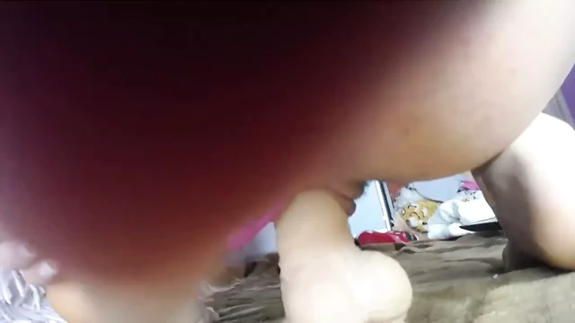 Huge ass is riding on a huge dildo