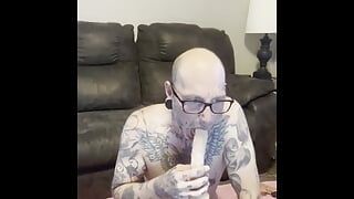 Tattooed Cuckold Sucks Dick