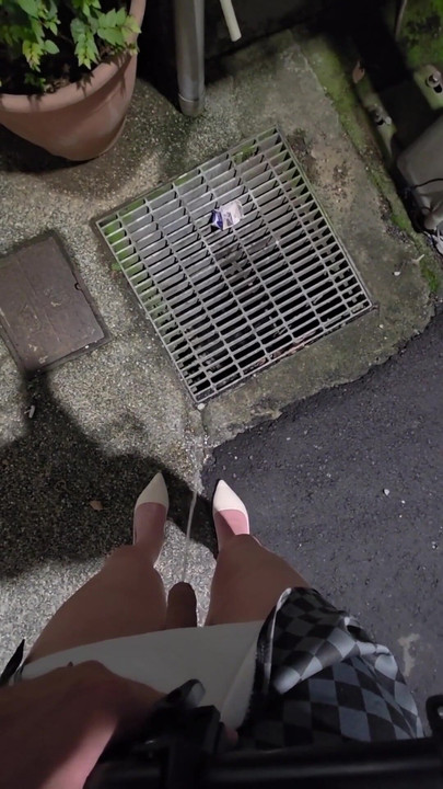 Key moment from "Shemale Ting xuan walks outside to pee, then masturbates and cums on her thigh."