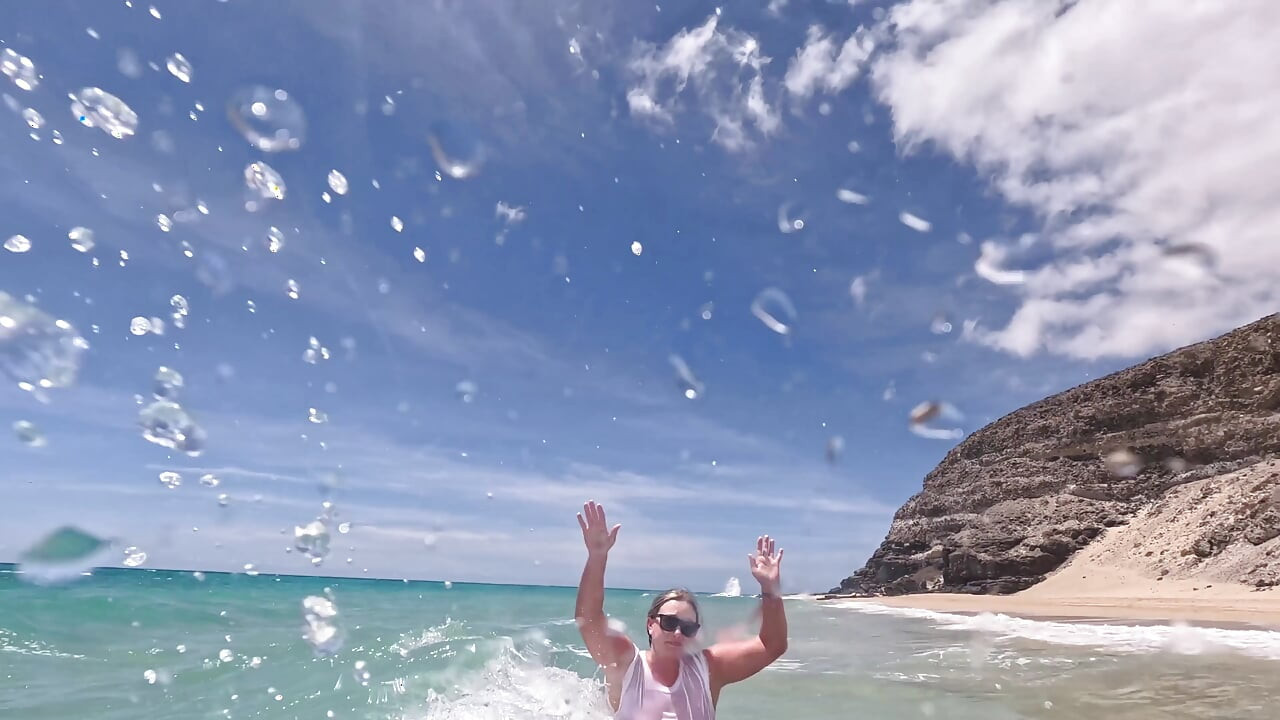 Girl Wetting Jeans in the Ocean and Swimming in Wet White T-shirt