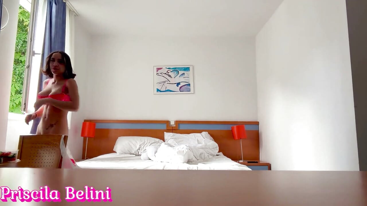 Woman Being Recorded in Hotel Room