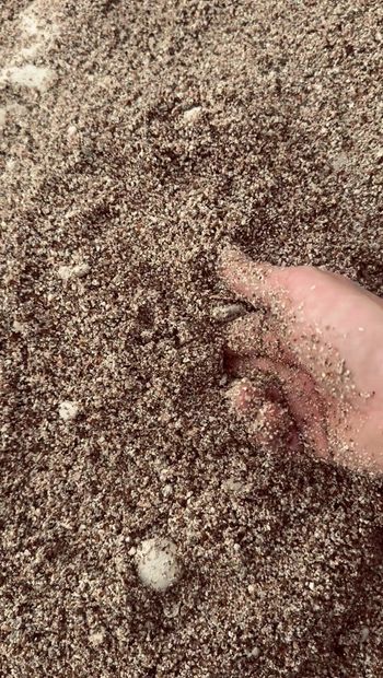 British Dannyroyal Playing around with the sand on the beach