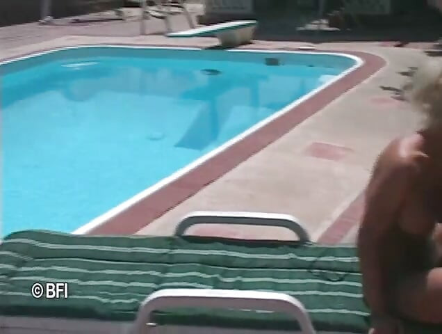 Milf at the pool. Her boobs and perfect pussy