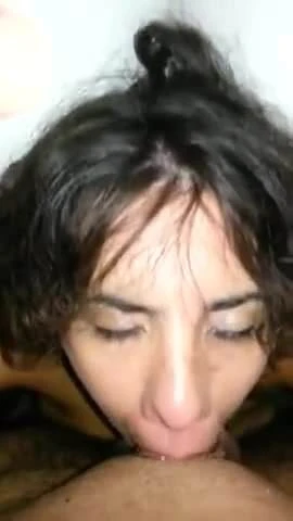 Brunette gives a blowjob and gets drenched by her man