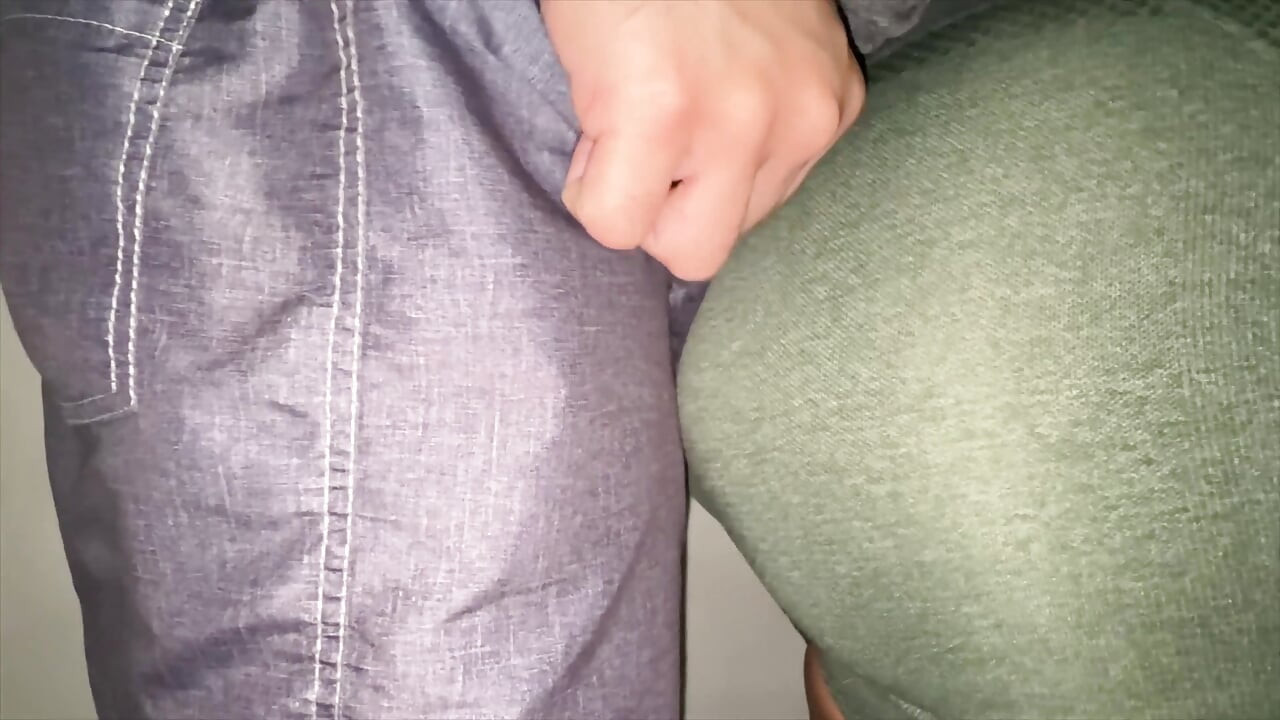 She Accidentally Grabs a Stranger's Dick While Waiting in Line
