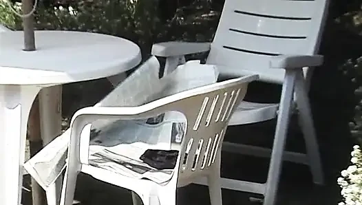 Blonde mature rubs her twat outdoors