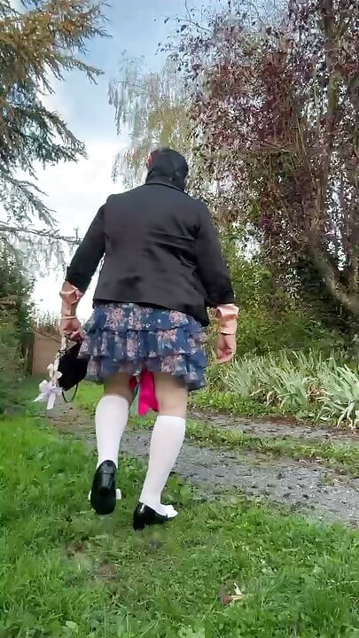In a quick outfit with a floral skirt for an evening