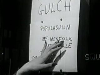 Alte 50er Jahre Nickel-Peep-Show-Kuh-Mädchen