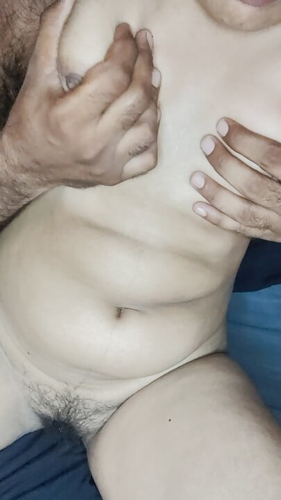 Fingers inserted into pink tight
