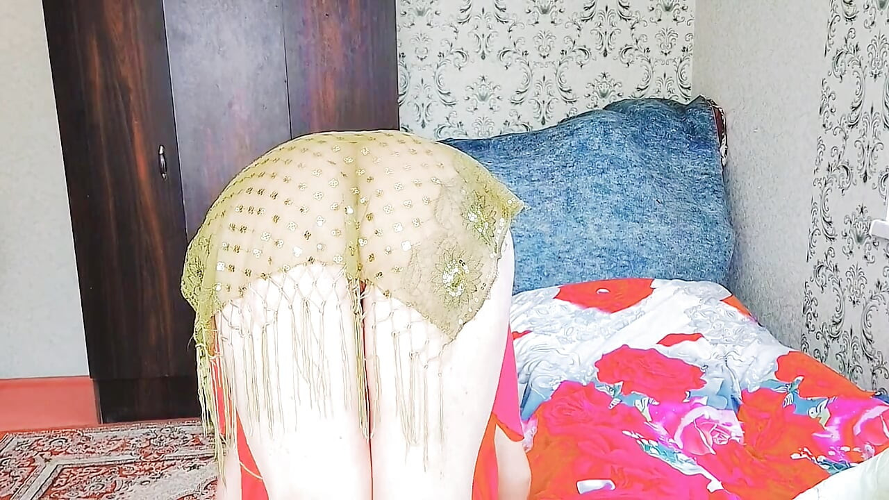 Lovely shemale lying in bed reading cute magazine