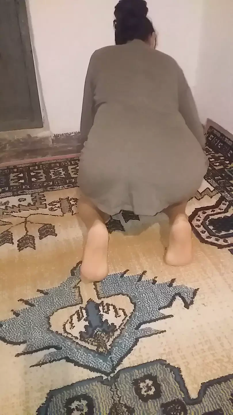 Mature stepmom cleaning carpet