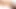 Slender redhead ladyboy in black dress jerks off till