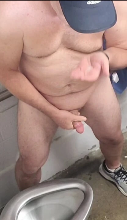 Swallowing my own cum in a public men's room