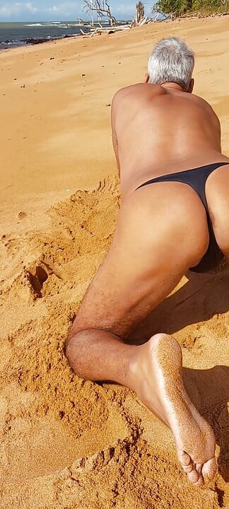 Ladysilva on the beach in panties showing off her hot ass